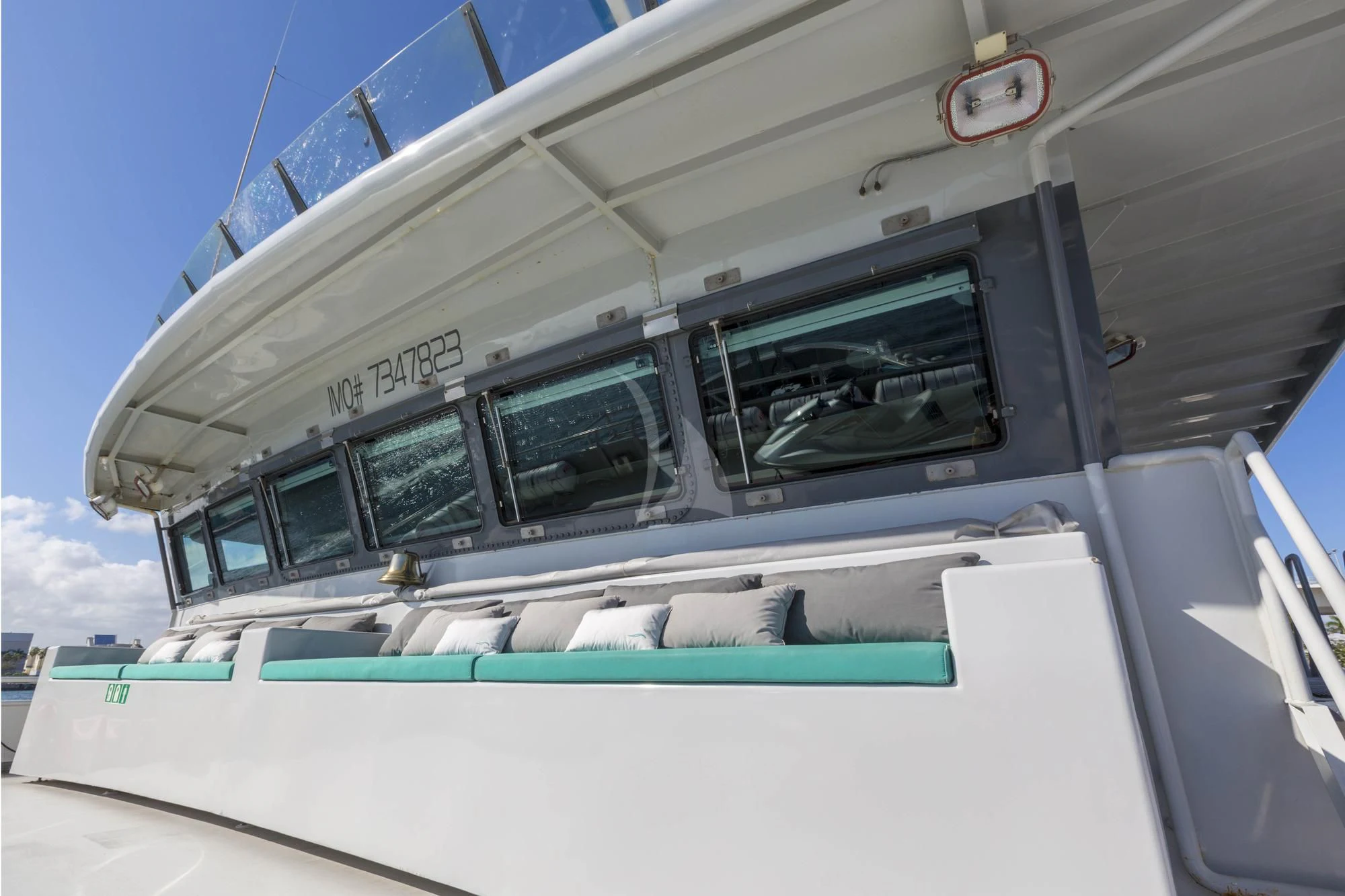 a boat with a glass door aboard HYDRA Yacht for Sale