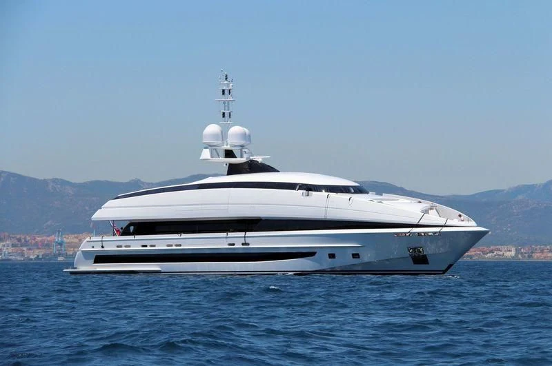 a white yacht on the water aboard CRAZY ME Yacht for Sale