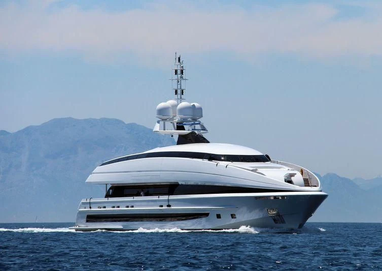 a large white boat in the water aboard CRAZY ME Yacht for Sale