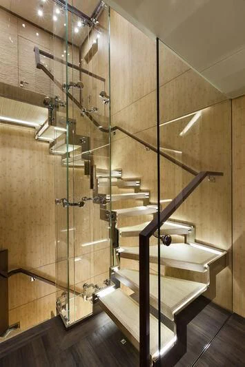 a bathroom with a glass shower aboard CRAZY ME Yacht for Sale