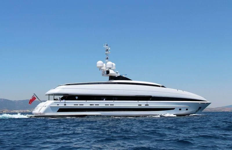 a white yacht in the water aboard CRAZY ME Yacht for Sale