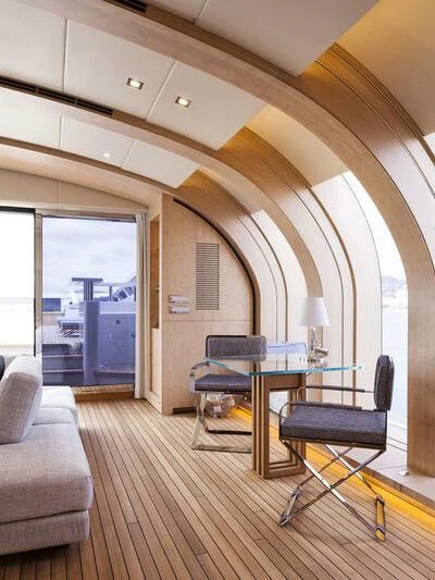 a room with a table and chairs aboard CRAZY ME Yacht for Sale