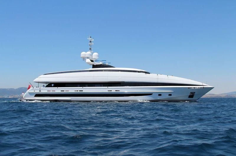 a white yacht in the water aboard CRAZY ME Yacht for Sale