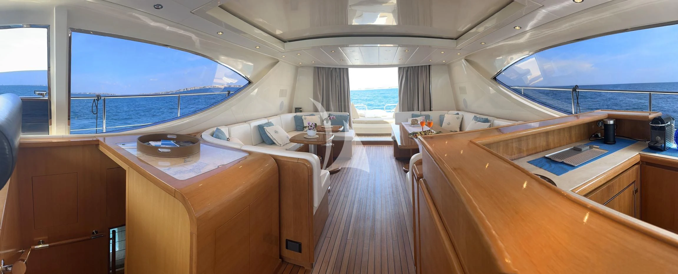 a room with a bed and desk aboard BRAVO DELTA Yacht for Sale