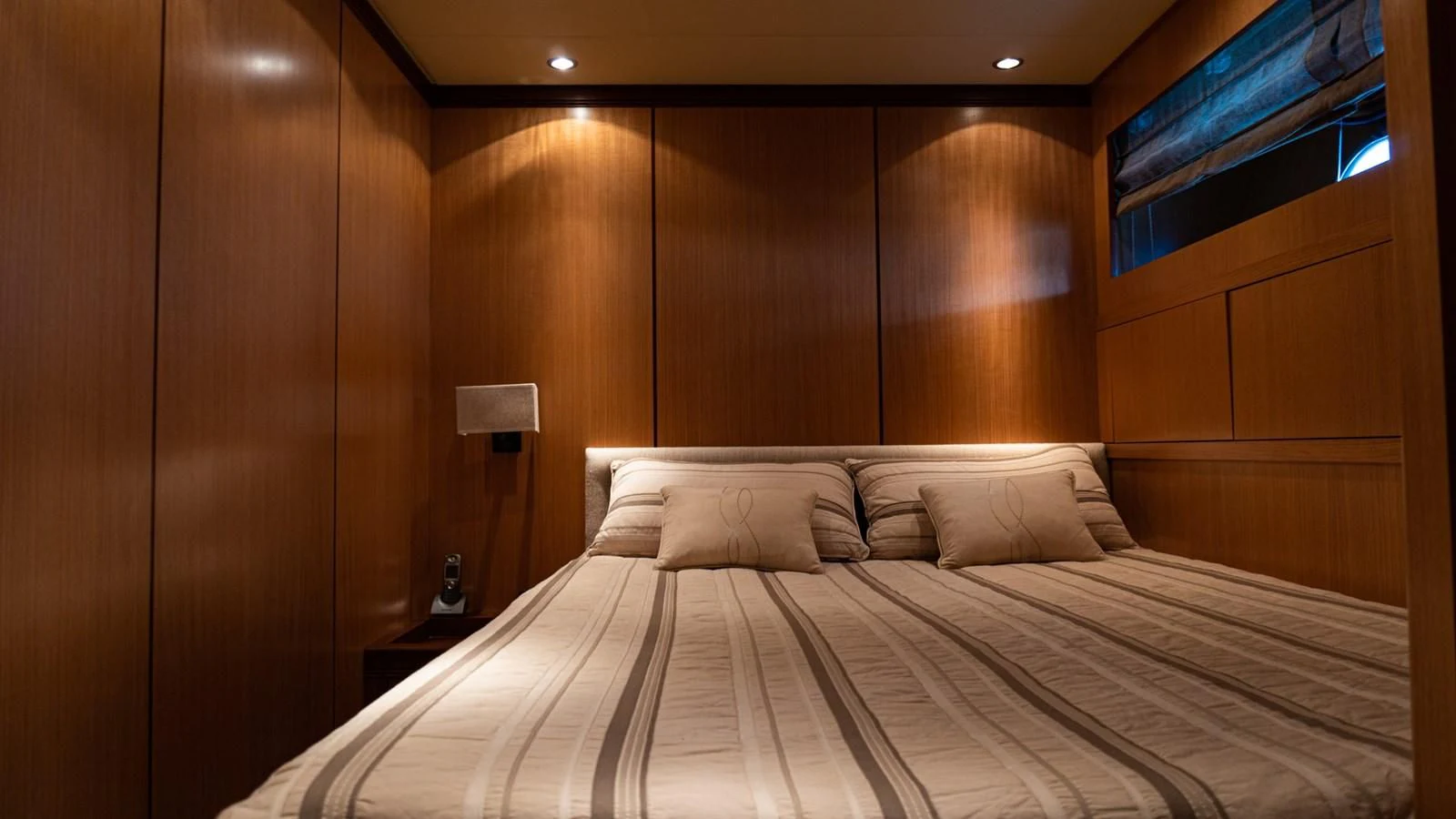 a bed with a white sheet aboard BRAVO DELTA Yacht for Sale