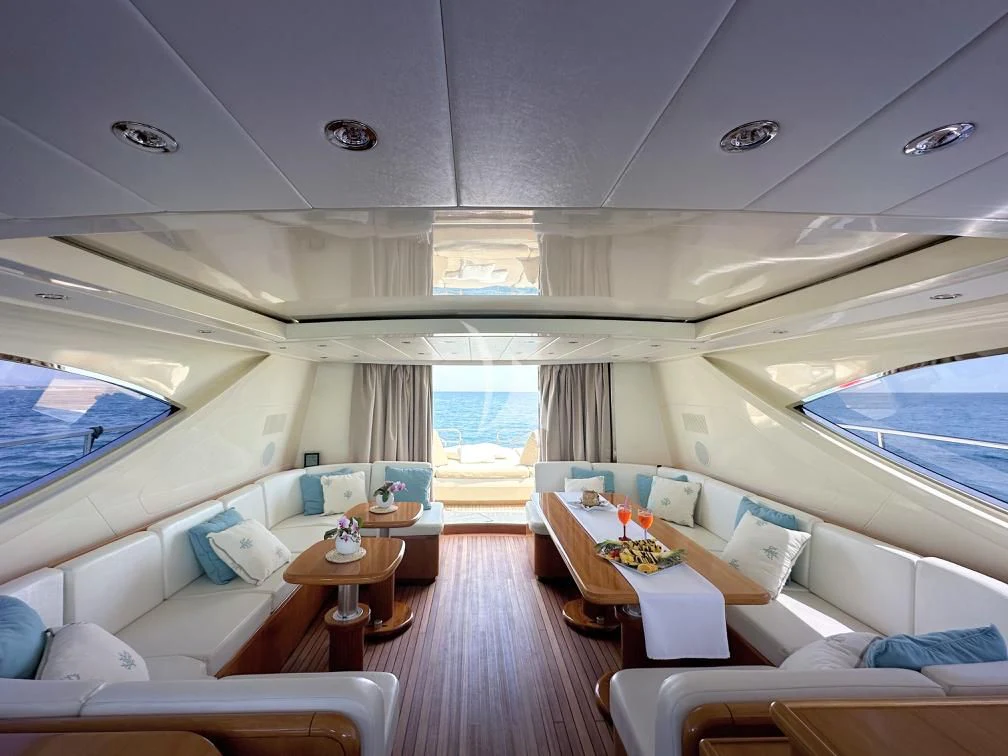 a room with a large window and a view of the ocean aboard BRAVO DELTA Yacht for Sale