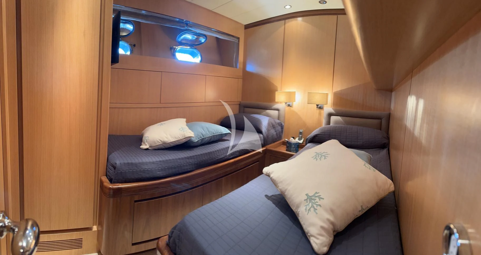 a room with two beds aboard BRAVO DELTA Yacht for Sale