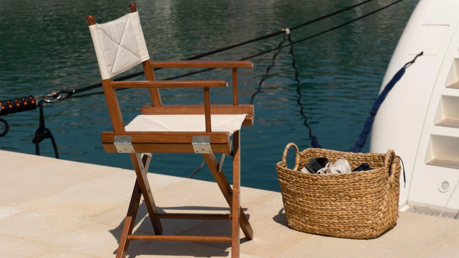a cat lying on a chair on a boat aboard BRAVO DELTA Yacht for Sale