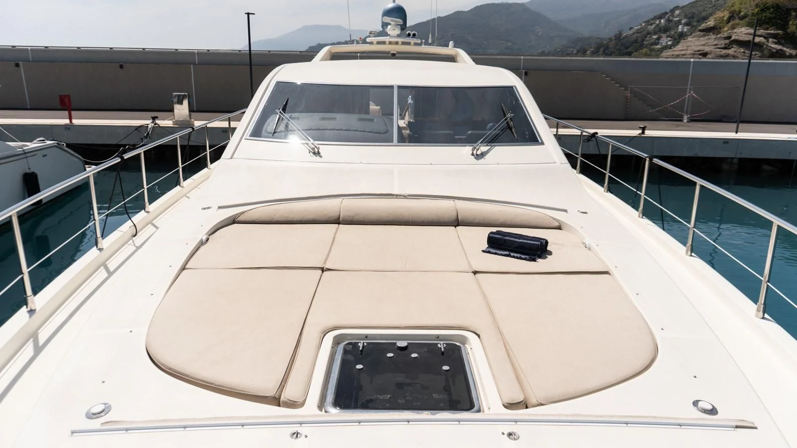 a white yacht on a dock aboard BRAVO DELTA Yacht for Sale
