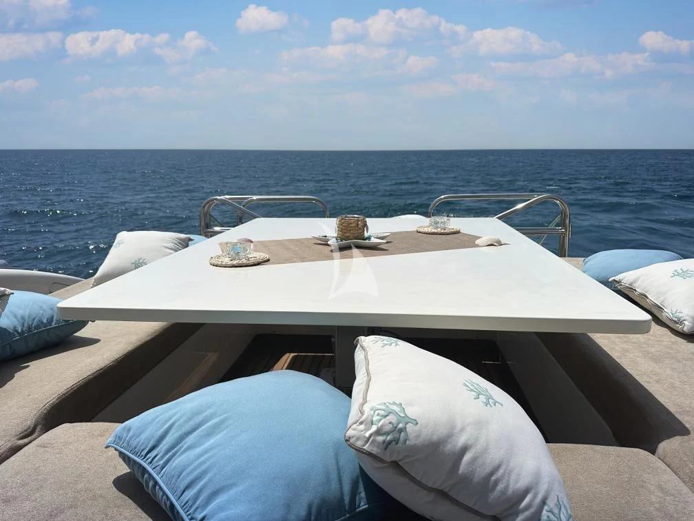 a table on a boat aboard BRAVO DELTA Yacht for Sale