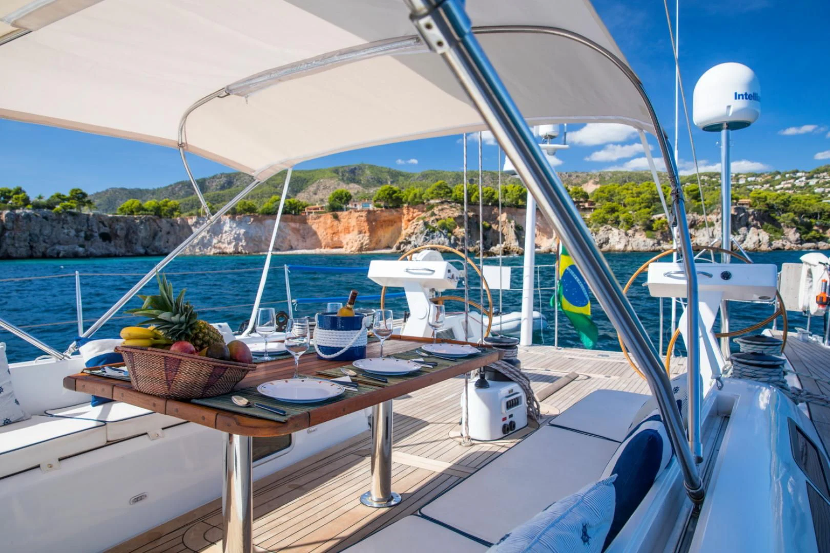 a table with a plant on it aboard INDIGO Yacht for Sale