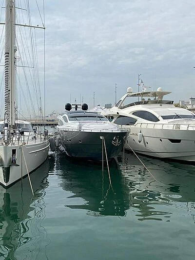 several boats are parked in a harbor aboard GIGAONE Yacht for Sale