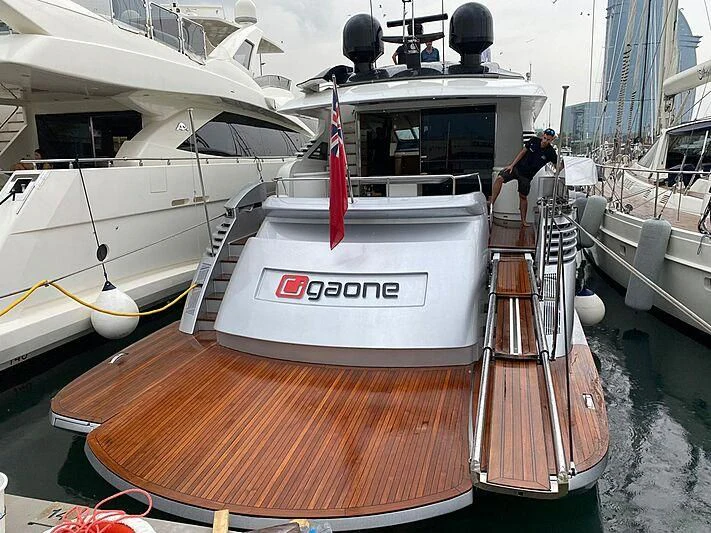 a boat docked at a pier aboard GIGAONE Yacht for Sale