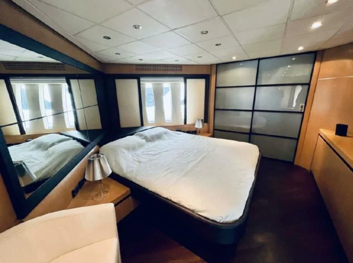 a room with two beds aboard GIGAONE Yacht for Sale