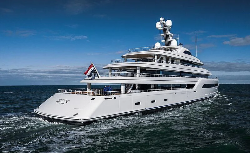 a large white boat in the water aboard ZEN Yacht for Charter