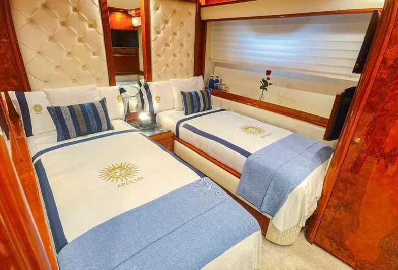 a couple of beds in a room aboard APOLLO I Yacht for Sale