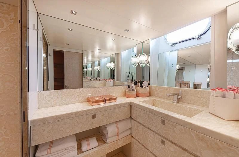 a bathroom with a large mirror aboard A2 Yacht for Sale