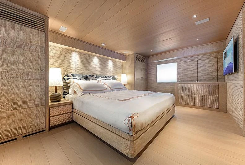 a large bedroom with a large bed aboard A2 Yacht for Sale
