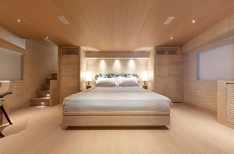 a large bedroom with a large bed aboard A2 Yacht for Sale