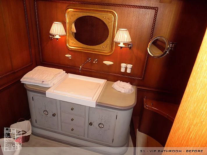 a bathroom with a vanity and mirror aboard A2 Yacht for Sale
