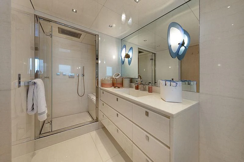 a bathroom with a shower and a sink aboard A2 Yacht for Sale