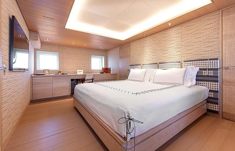 a large bedroom with a large bed aboard A2 Yacht for Sale