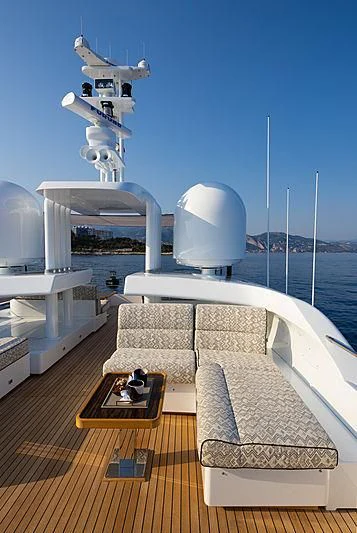 a deck with a white building and a white tower with white satellites aboard A2 Yacht for Sale