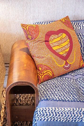 a pair of shoes on a bed aboard A2 Yacht for Sale