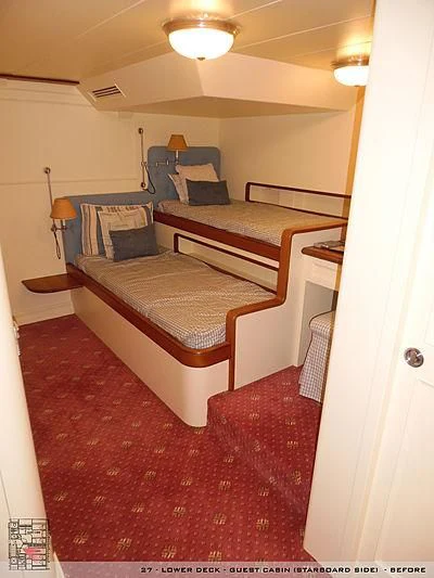 a room with two beds aboard A2 Yacht for Sale