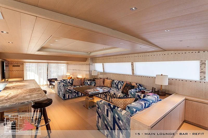 a living room with a couch and a table aboard A2 Yacht for Sale