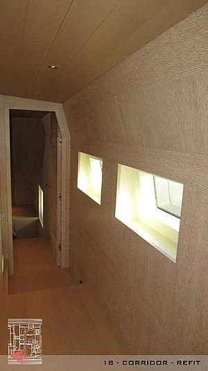 a room with a door and windows aboard A2 Yacht for Sale