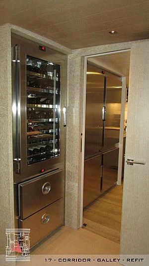 a large closet with glass doors aboard A2 Yacht for Sale