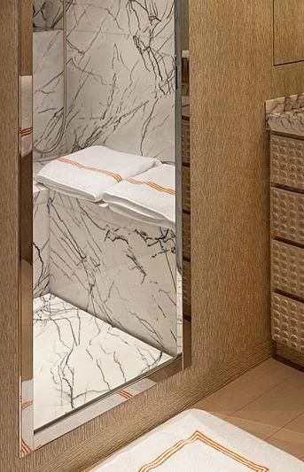 a room with a bed and a mirror aboard A2 Yacht for Sale