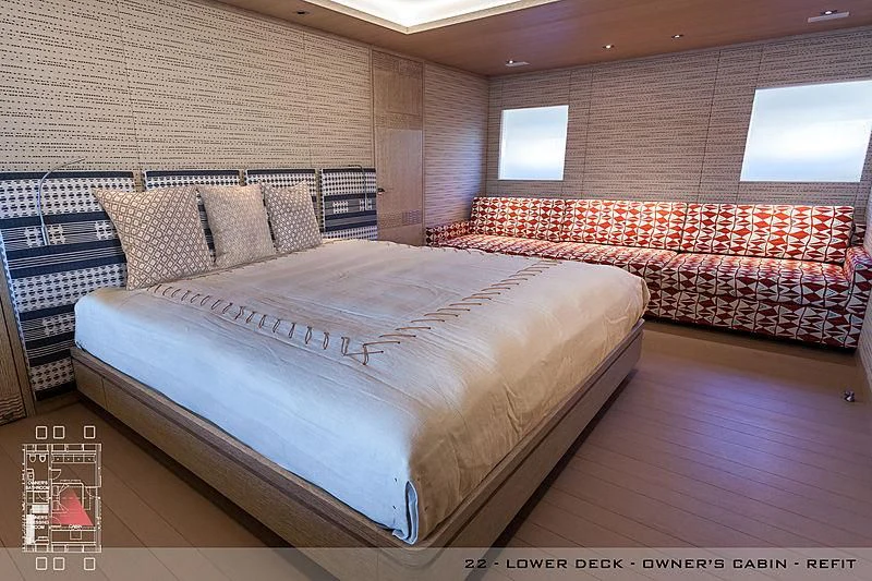 a room with a bed and a window aboard A2 Yacht for Sale