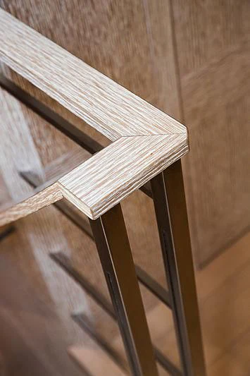 a wooden chair on a wooden floor aboard A2 Yacht for Sale