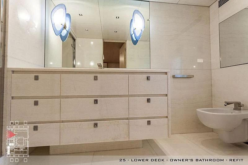 a bathroom with a sink and mirrors aboard A2 Yacht for Sale