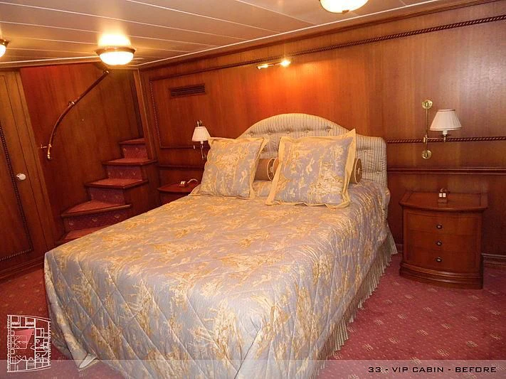 a bed with a large bed aboard A2 Yacht for Sale