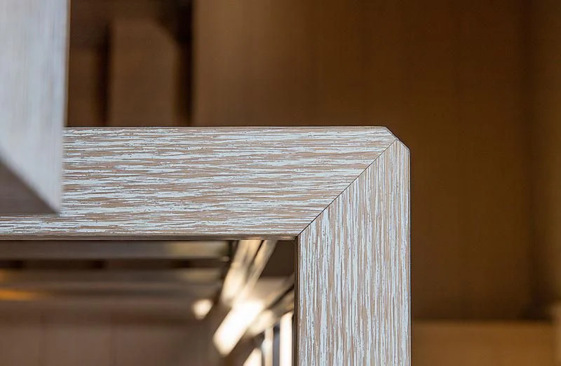 a wooden table with a white cloth on it aboard A2 Yacht for Sale