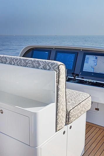 a white dresser with a large window aboard A2 Yacht for Sale