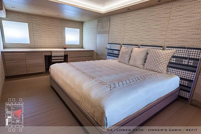 a room with a bed and a desk aboard A2 Yacht for Sale