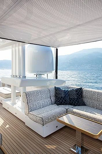 a couch and a table on a boat aboard A2 Yacht for Sale