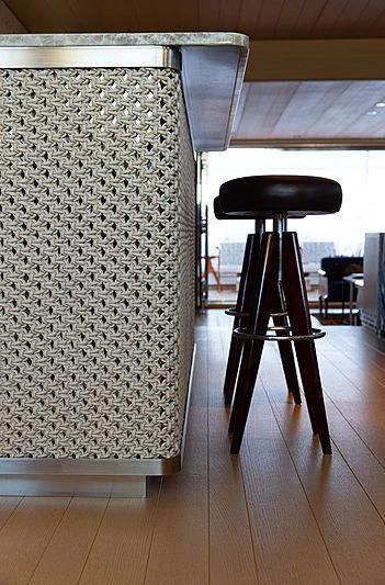 a chair next to a table aboard A2 Yacht for Sale