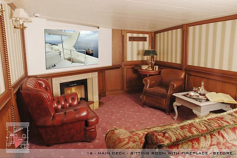 a living room with a fireplace aboard A2 Yacht for Sale