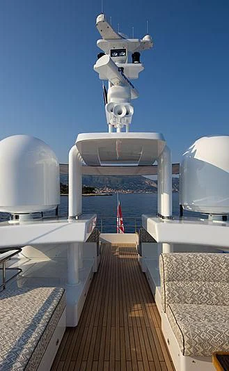 a group of white satellite dishes on a white building aboard A2 Yacht for Sale