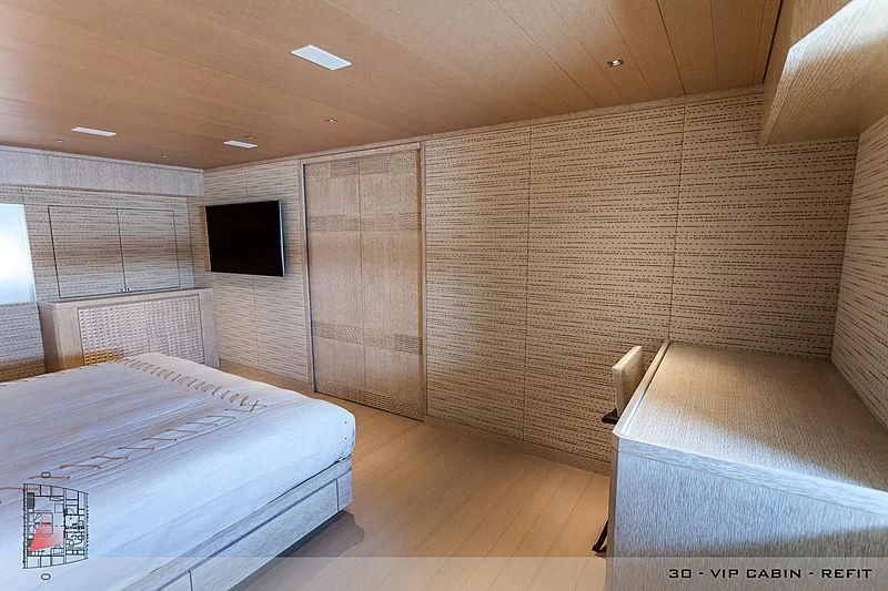 a room with a bed and a chair aboard A2 Yacht for Sale