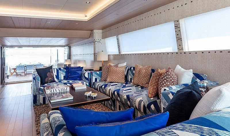 a living room with a couch and a coffee table aboard A2 Yacht for Sale