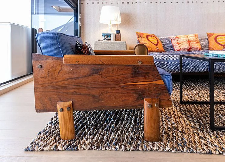 a bed with a wooden frame aboard A2 Yacht for Sale