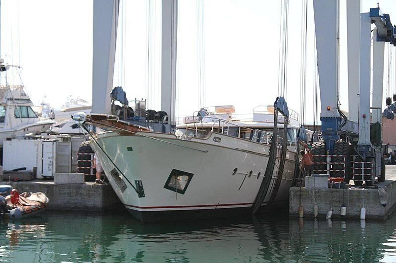 a boat docked in a harbor aboard ONE FORCE Yacht for Sale