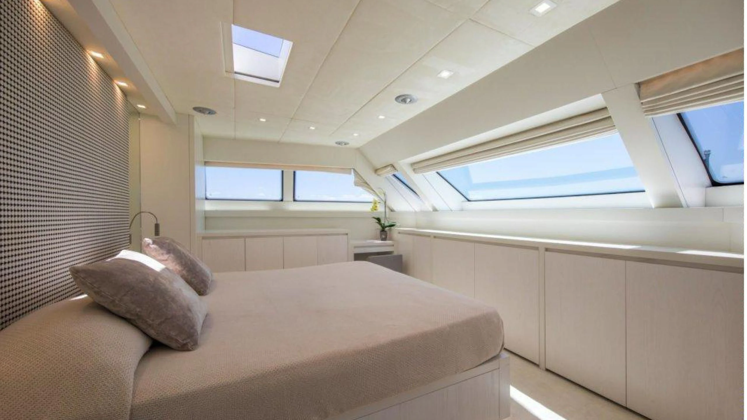 a bed in a room aboard MAI Yacht for Sale