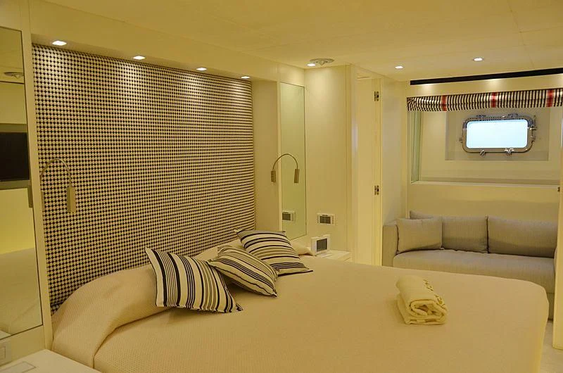 a bed in a room aboard MAI Yacht for Sale